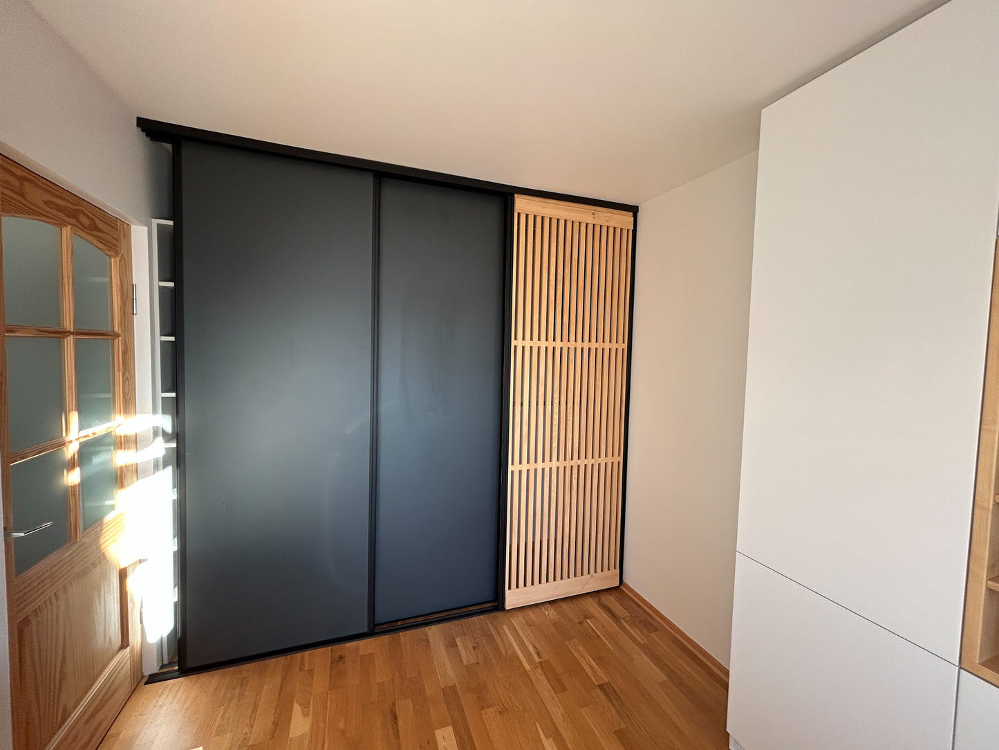 Home office large desks with windowsills, bookcase and display shelves