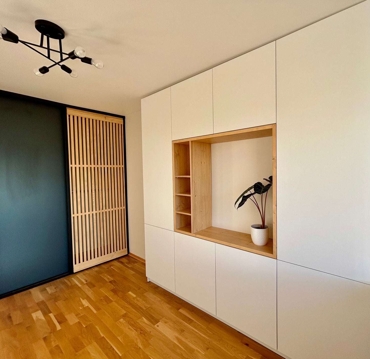 Home office large desks with windowsills, bookcase and display shelves