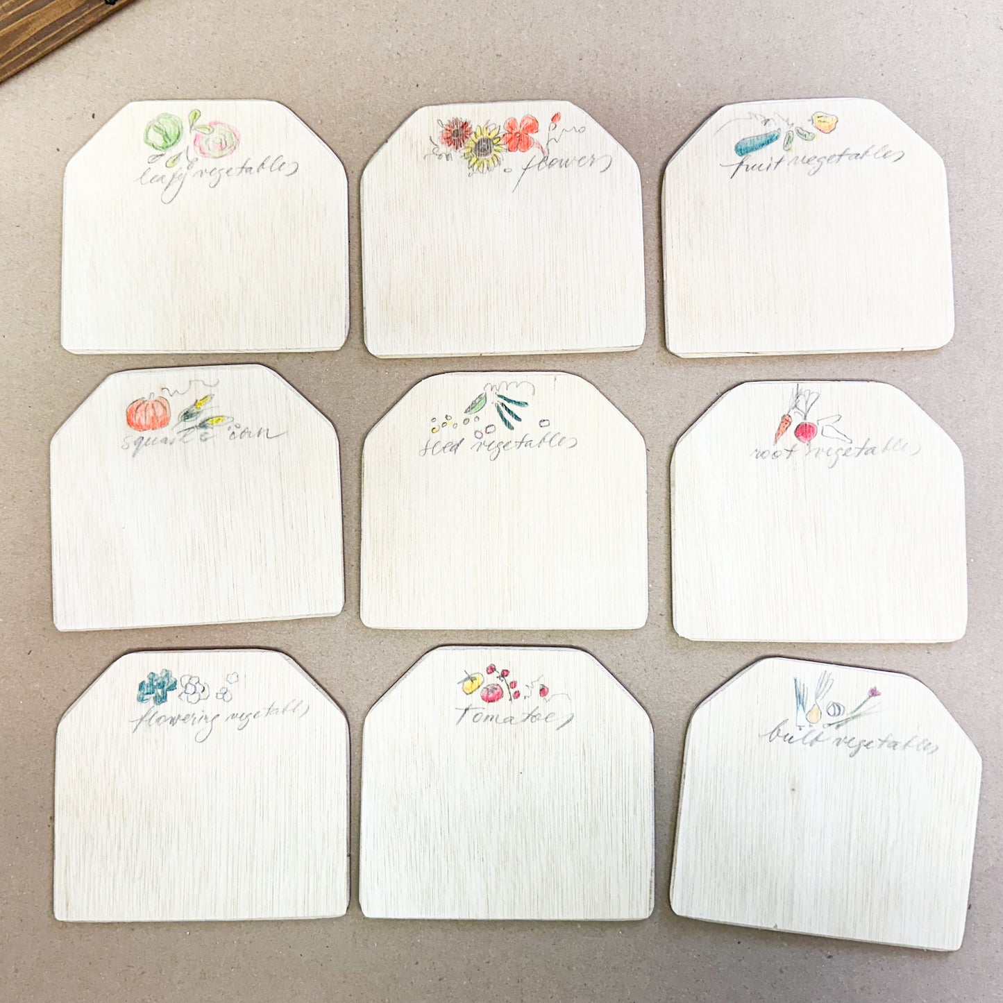 Set of plywood labels with colourful illustrations handmade