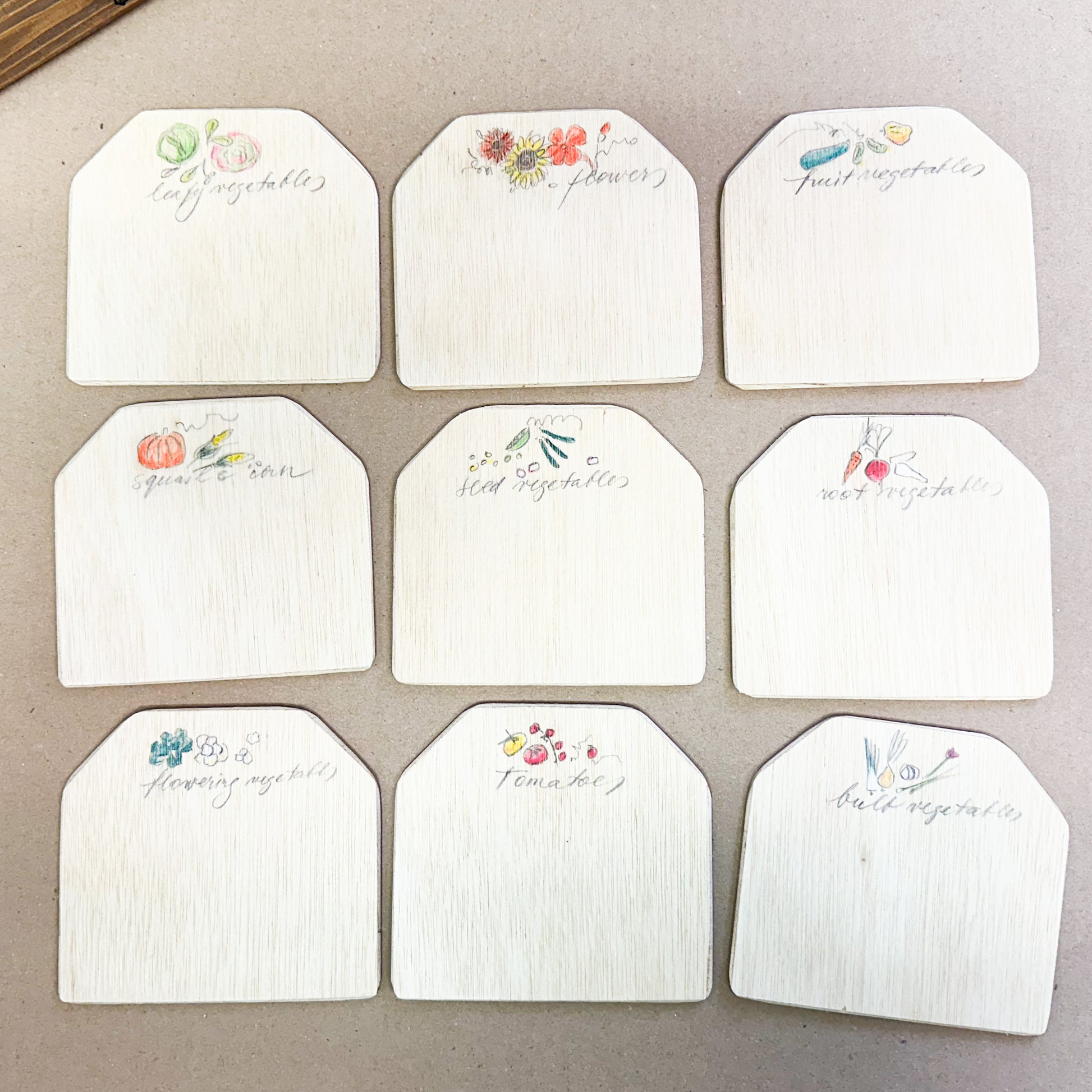 Set of plywood labels with colourful illustrations handmade